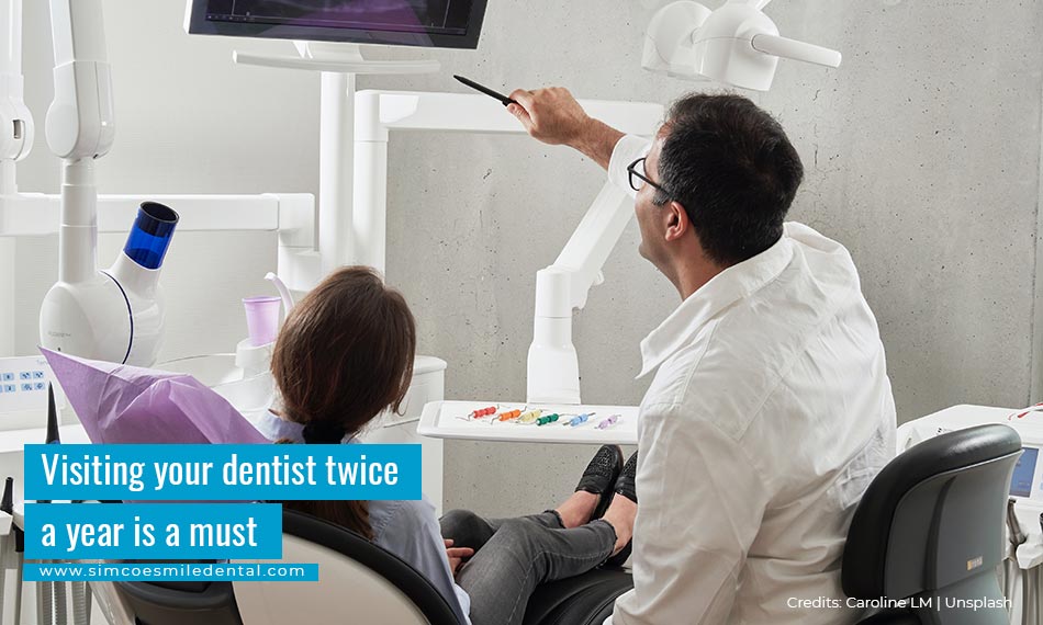 Visiting your dentist twice a year is a must