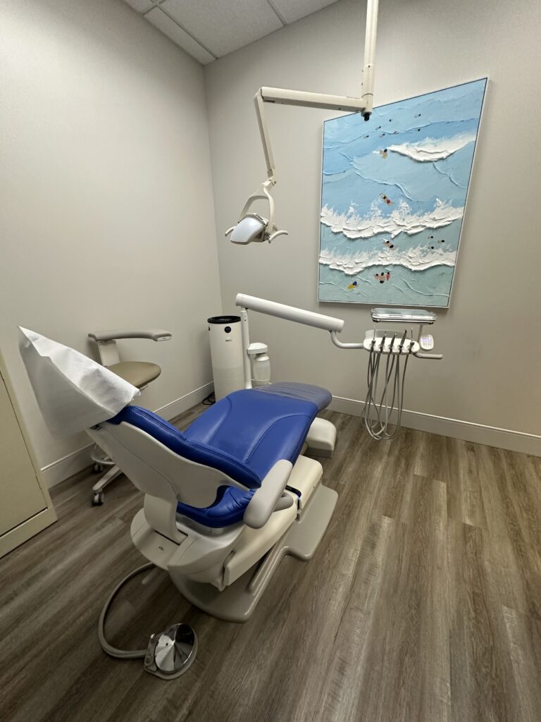 Treatment room with ocean artwork